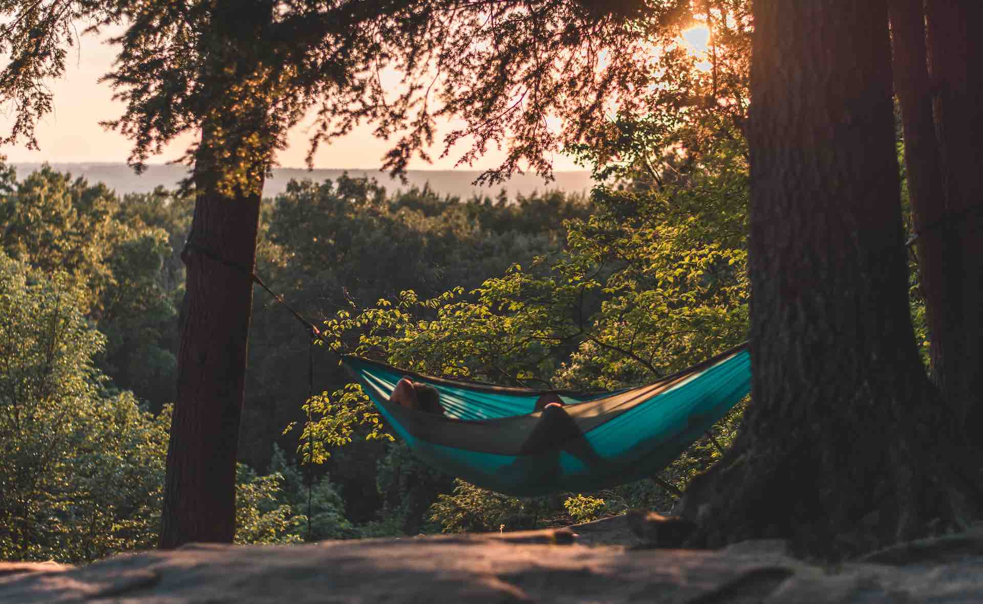 guy relaxing in a hammock