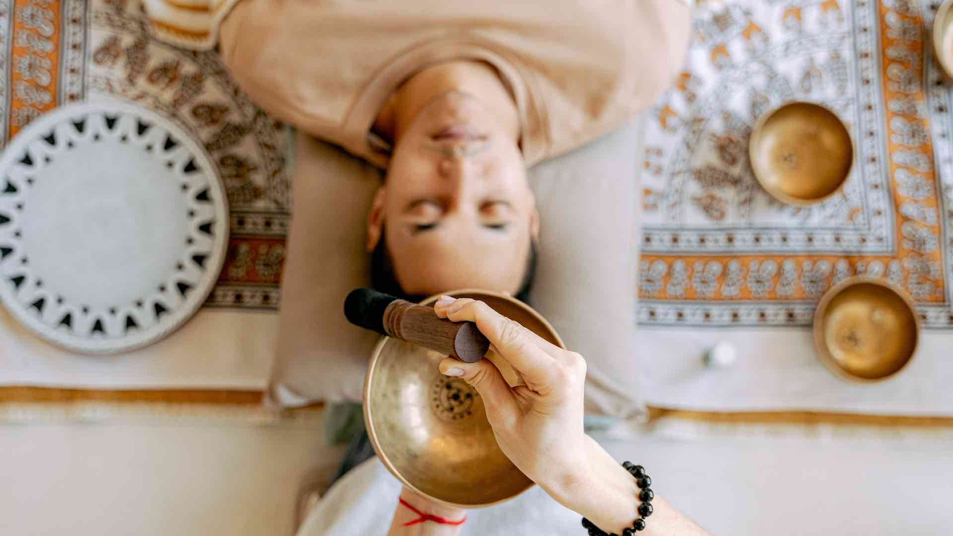 A person lying on the floor looking relaxed